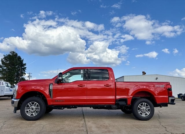2026 Ford Super Duty F-250 Lariat in Race Red — front three-quarter view
