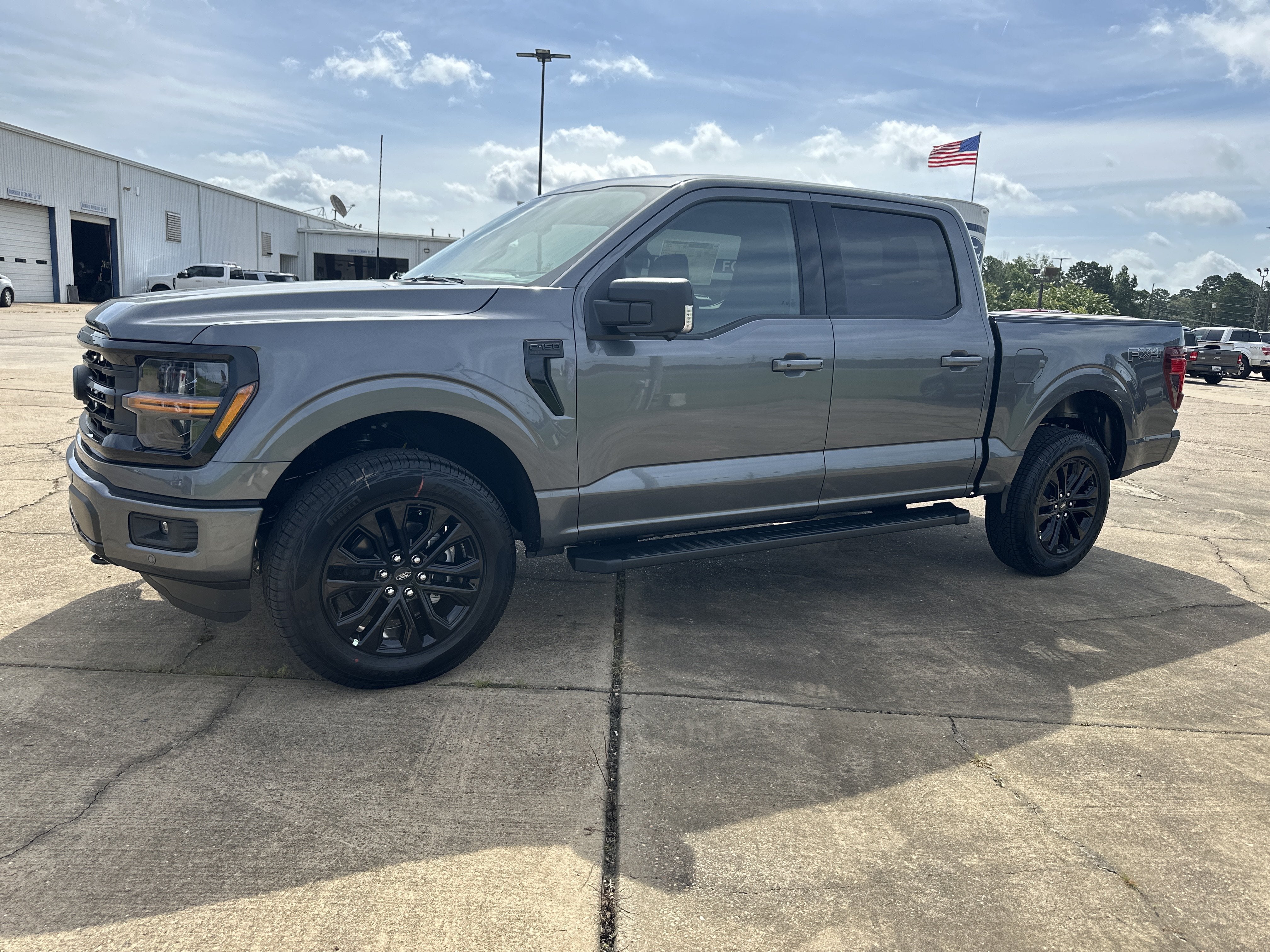 2026 Ford F-150 XLT in Carbonized Gray Metallic — front three-quarter view