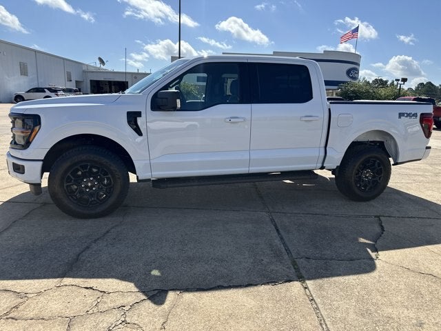 2026 Ford F-150 XLT in Oxford White — front three-quarter view