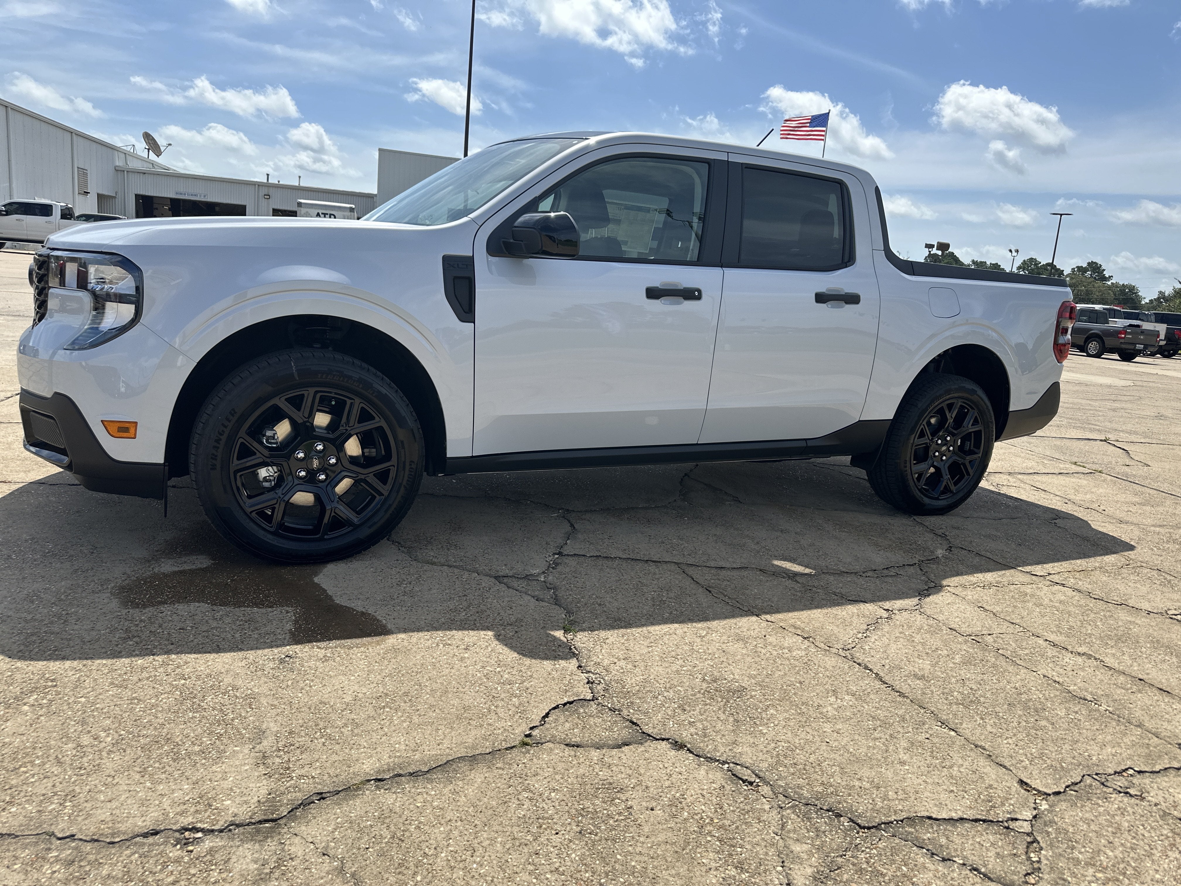2026 Ford Maverick XLT in Space White Metallic — front three-quarter view