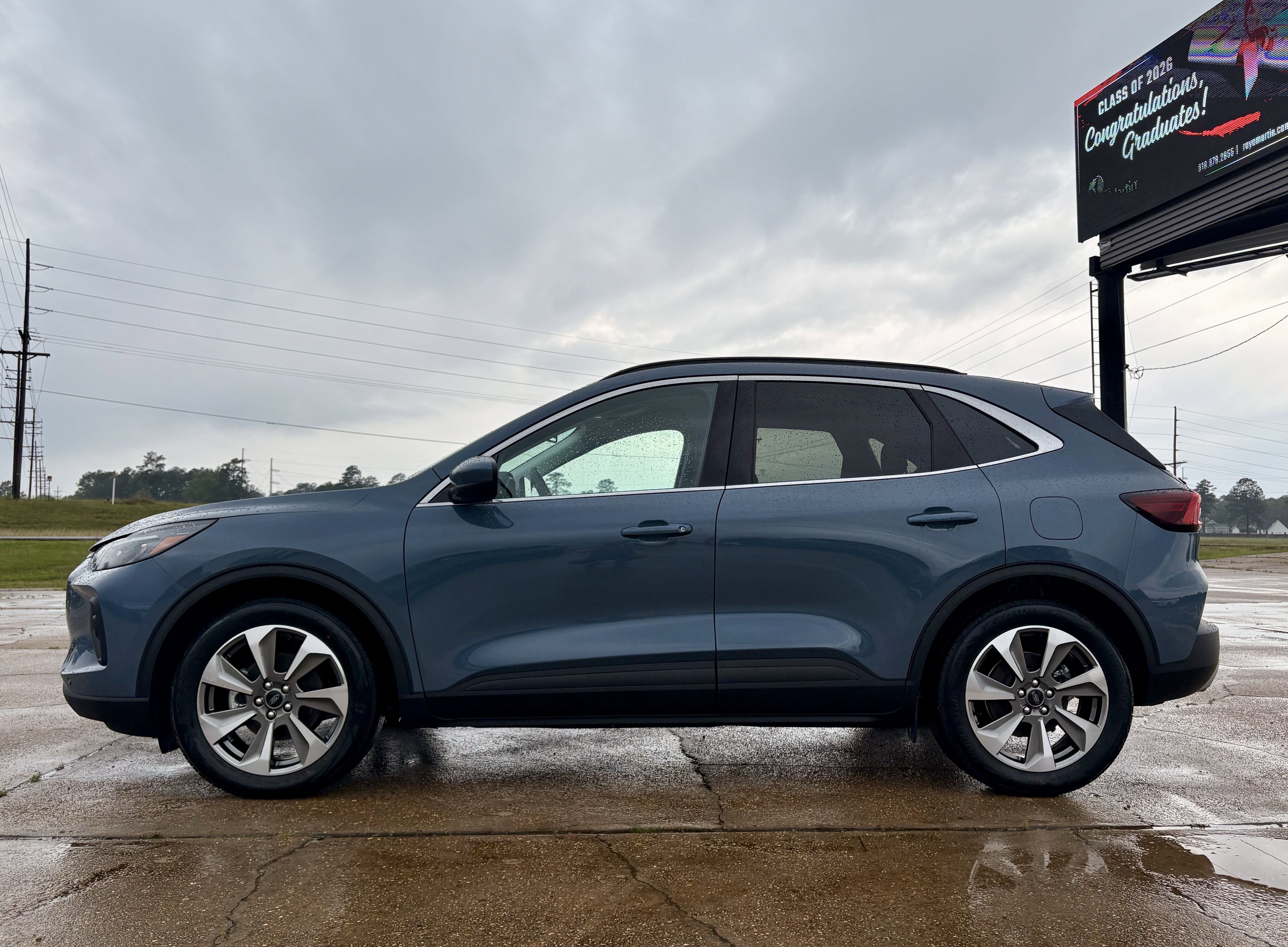 2025 Ford Escape Platinum in Blue — front three-quarter view