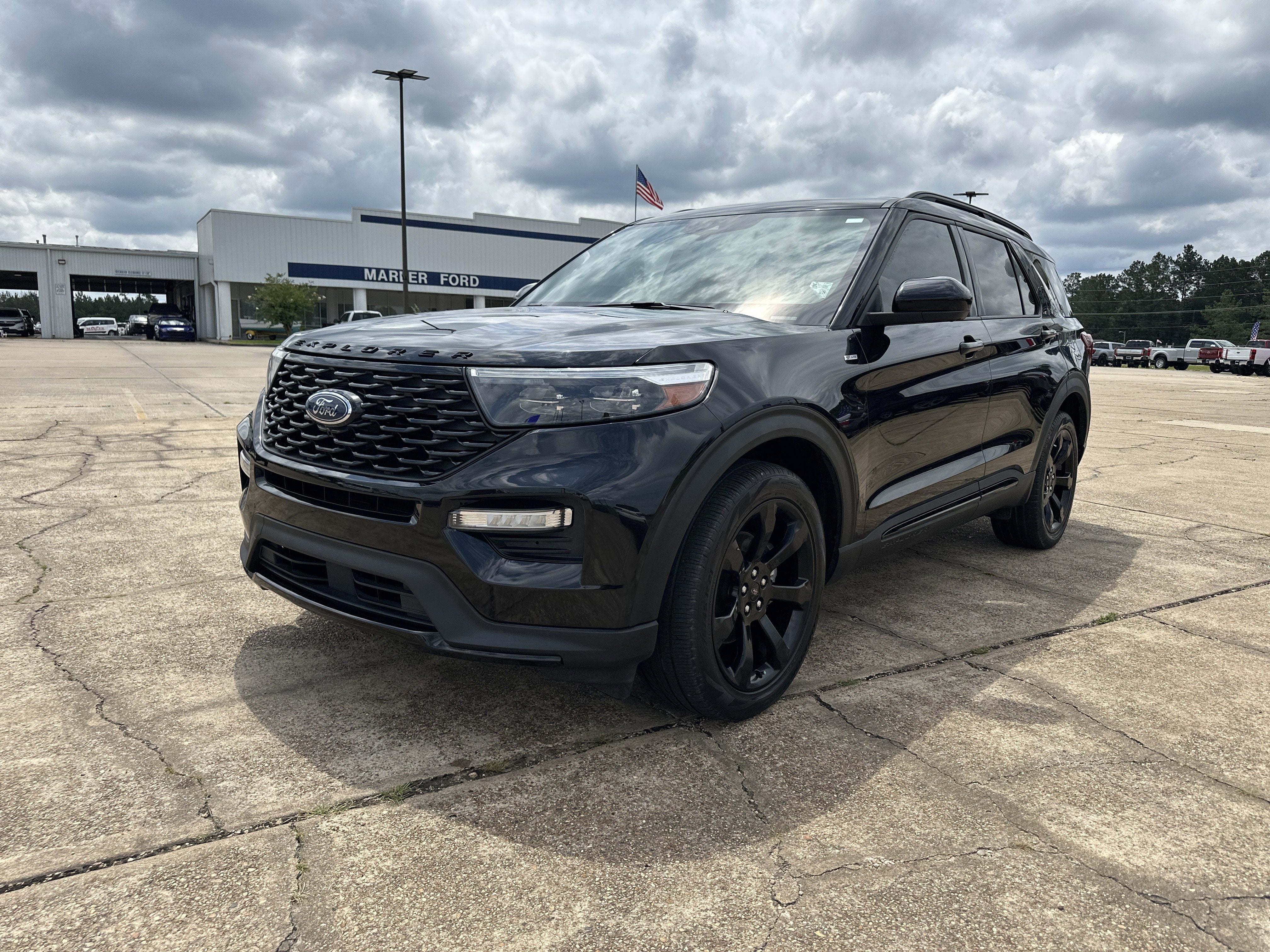 2022 Ford Explorer ST-Line in Agate Black Metallic — front three-quarter view