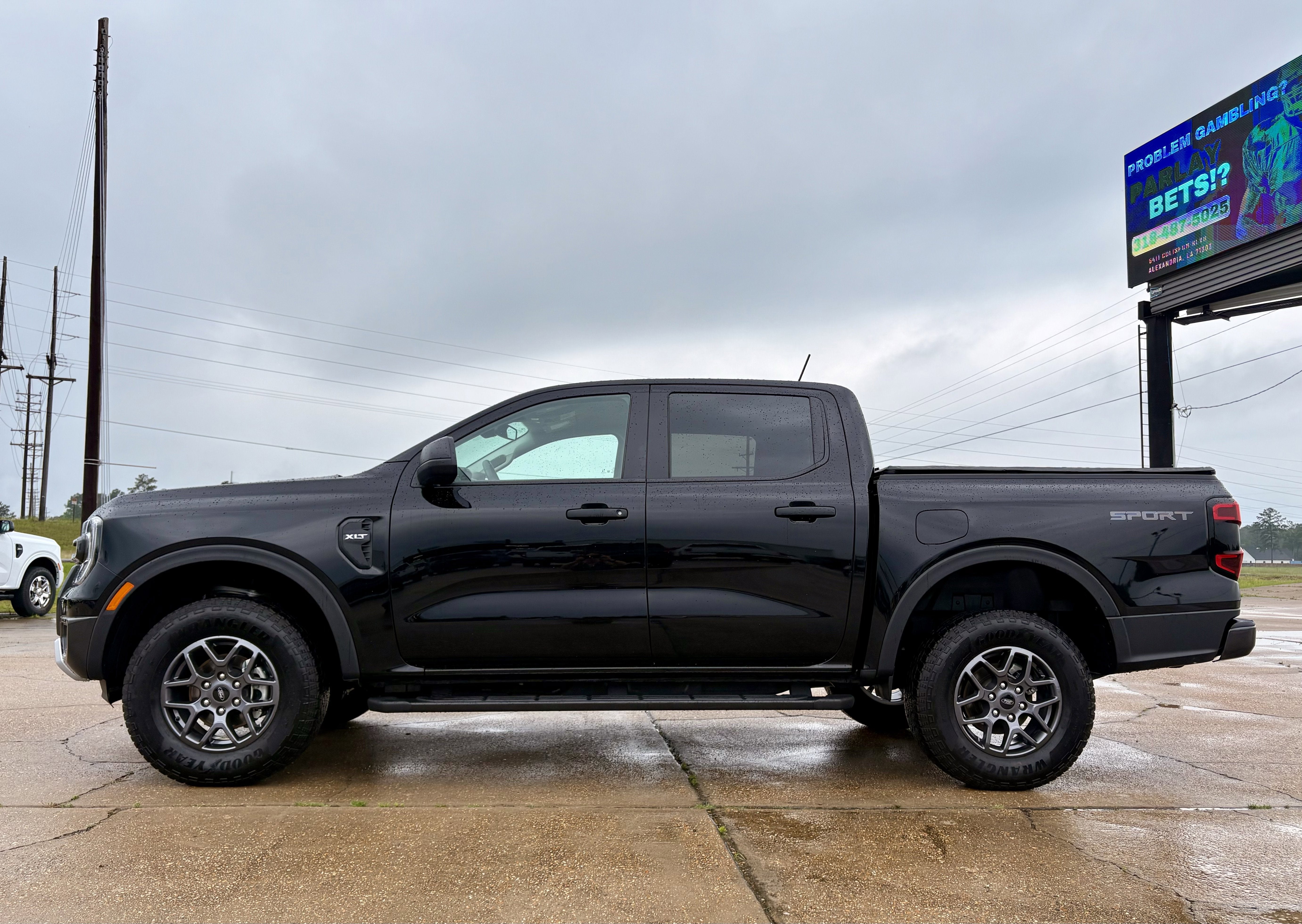 2025 Ford Ranger XLT in Black — front three-quarter view