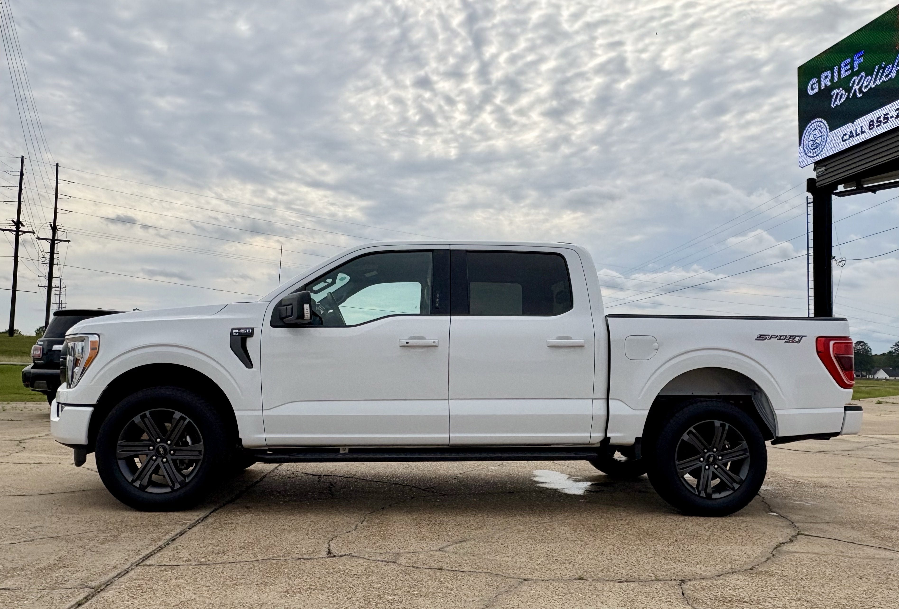 2023 Ford F-150 Base in White — front three-quarter view