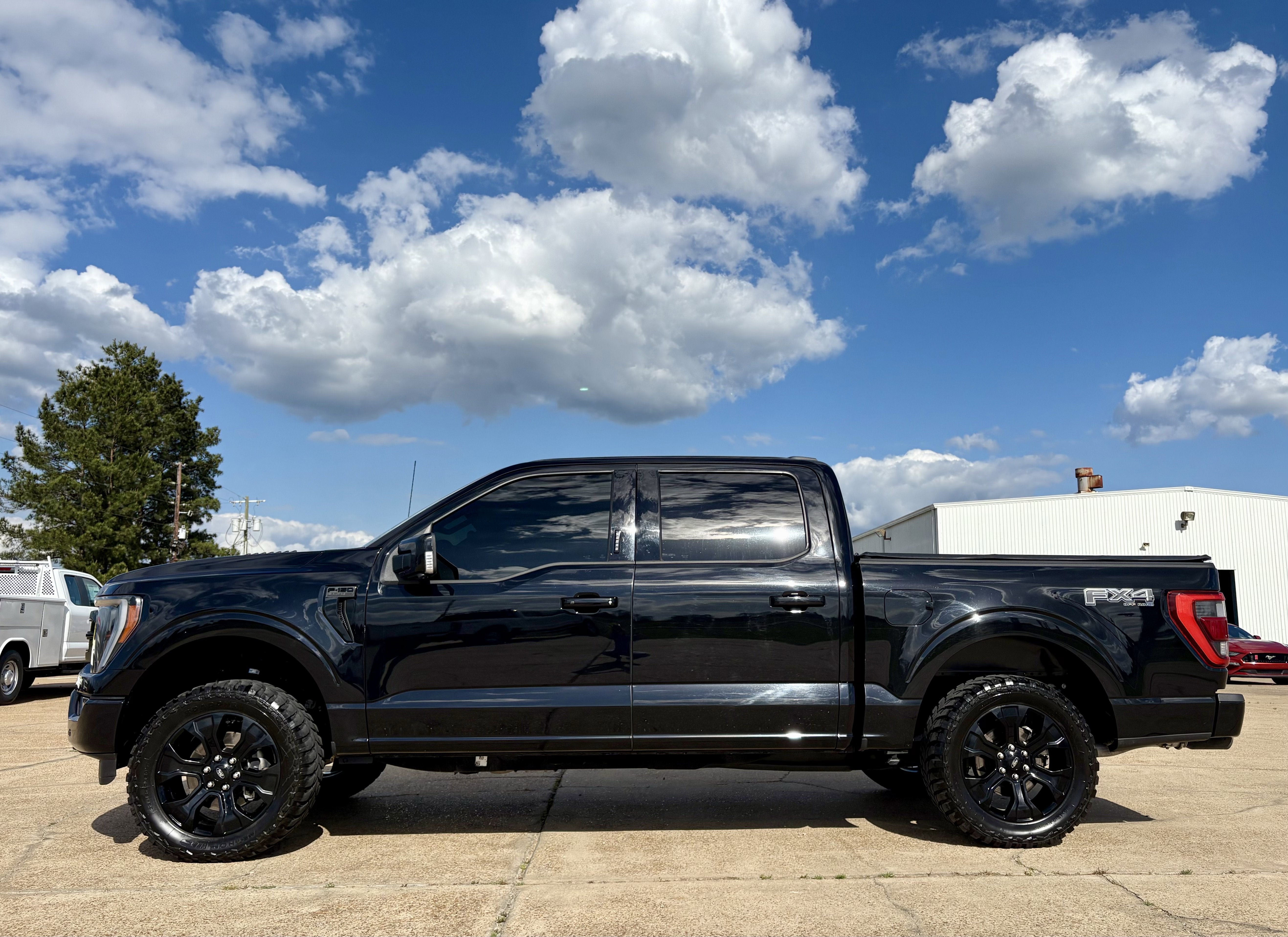2023 Ford F-150 Base in Black — front three-quarter view